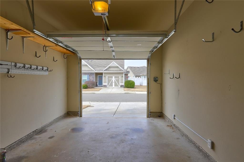 505 Riverview Lane Canton, GA 30114 - Photo 30 of 34 a view of a hallway with a glass door