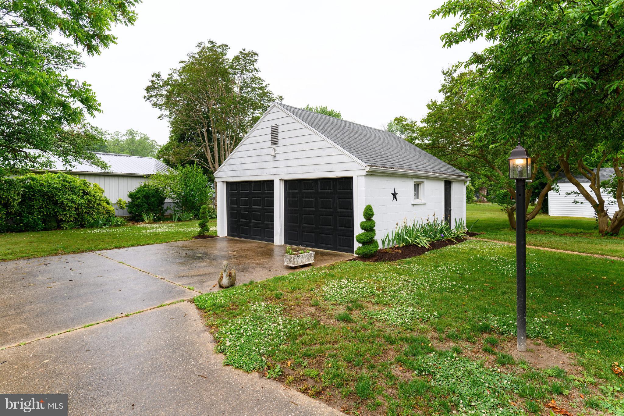 207 Crusader Road Cambridge, MD 21613 - Photo 76 of 76 a front view of a house with yard and green space