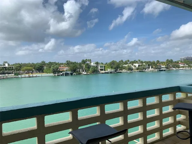 a view of a lake from a balcony