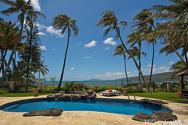 271 Portlock Road Honolulu, HI 96825 - Photo 1 of 1 a view of a lake with lawn chairs