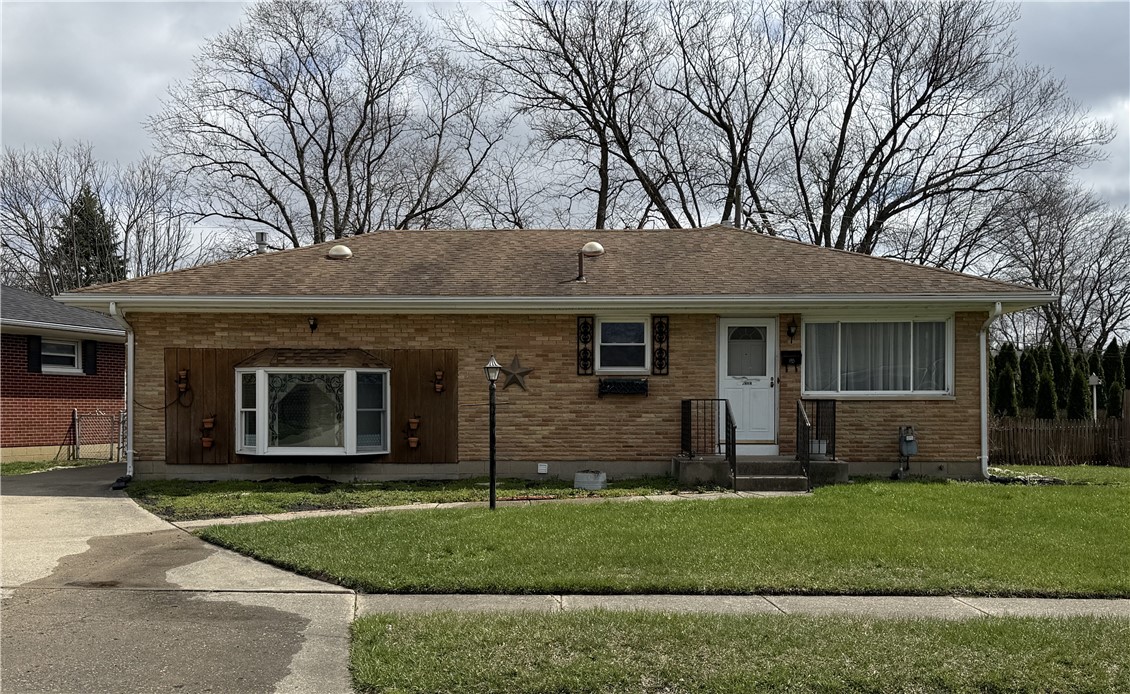 4732 Lehigh Drive Springfield, OH 45503 - Photo 5 of 27 This charming residence features classic brick construction and a well-maintained exterior.