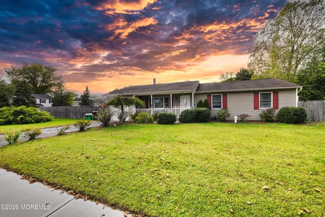 a view of a house with a big yard