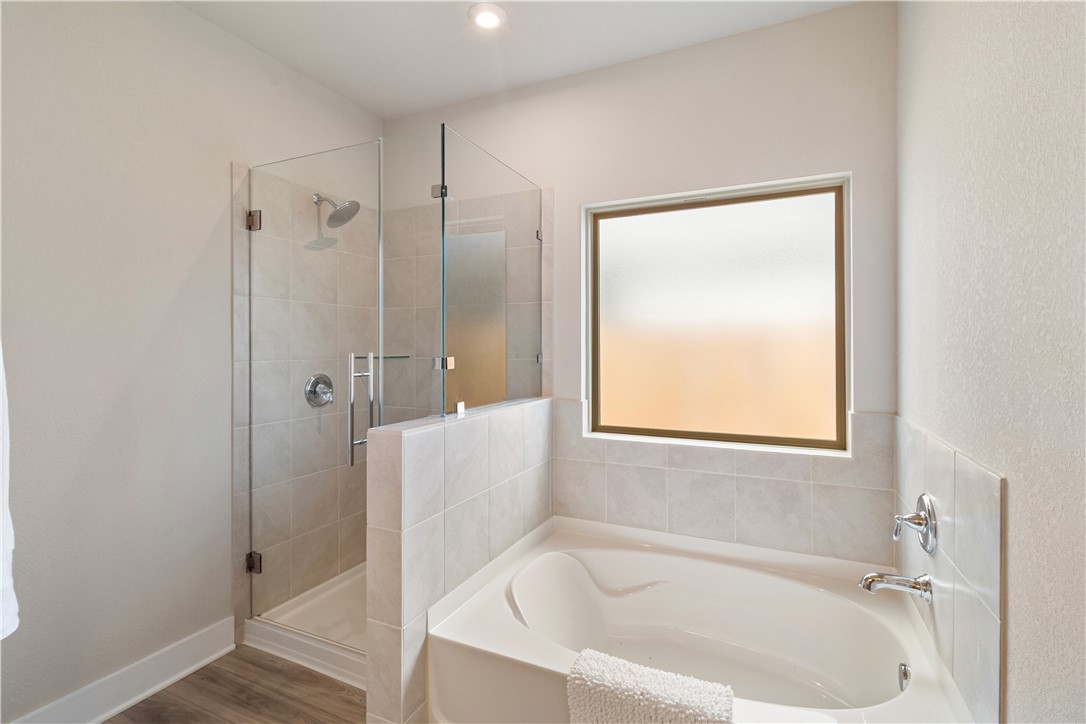 6303 Raleigh Drive College Station, TX 77845 - Photo 9 of 23 a white bath tub sitting next to a shower