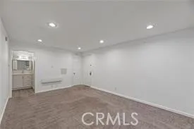 a view of a big room with windows