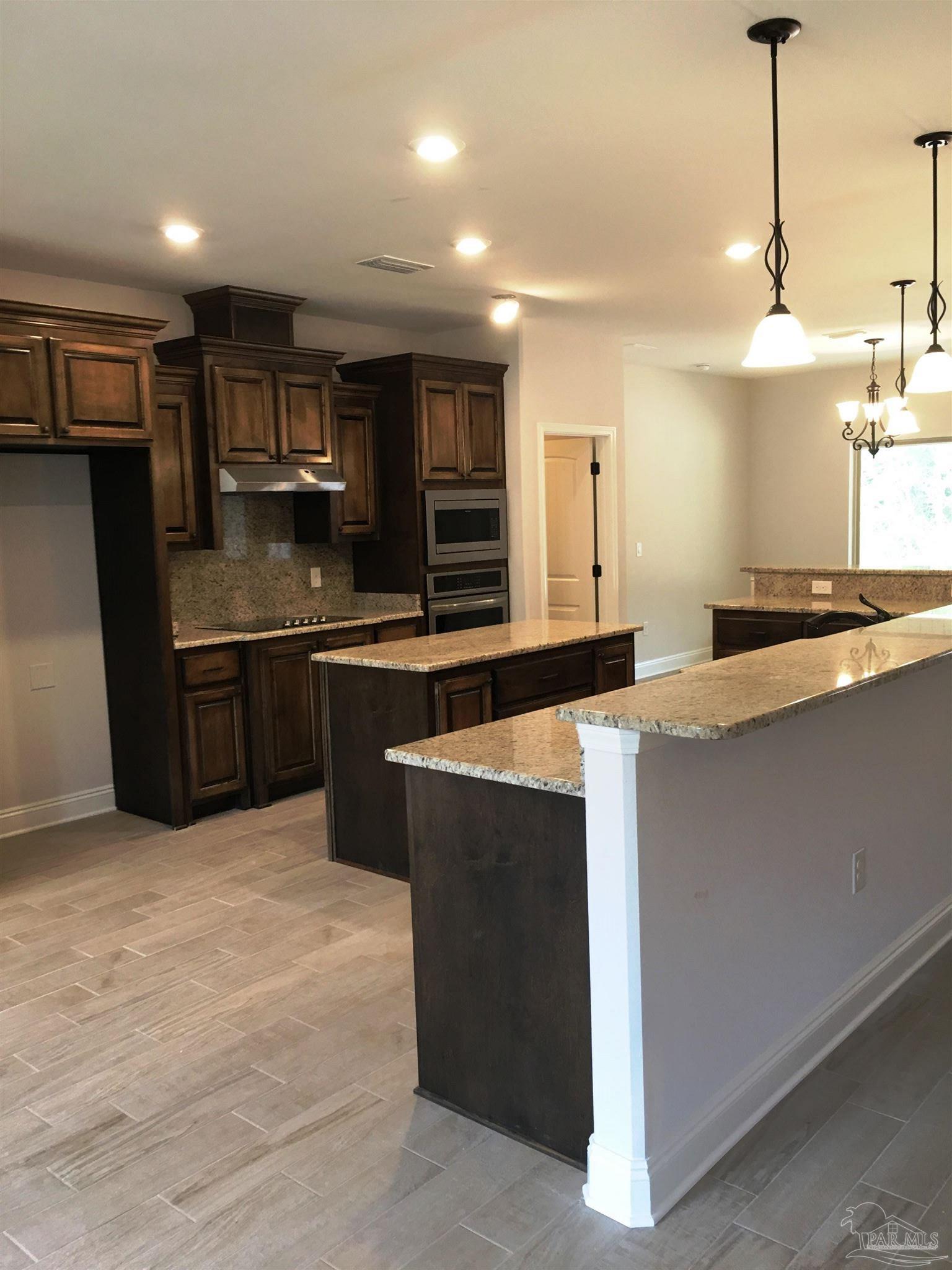 5336 South A Jones Road Milton, FL 32583 - Photo 6 of 33 Kitchen will have electric stove/vented microhood.