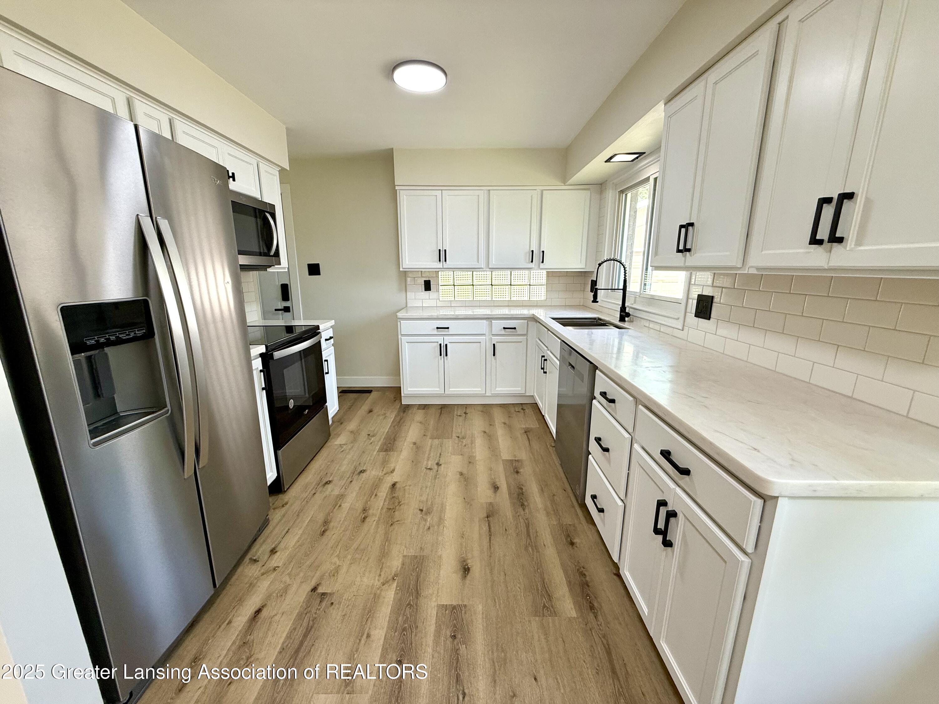2683 Grovenburg Road Lansing, MI 48911 - Photo 15 of 50 IMG_4175