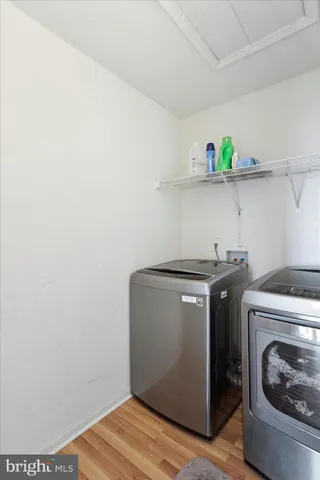 a utility room with a sink a washer and dryer