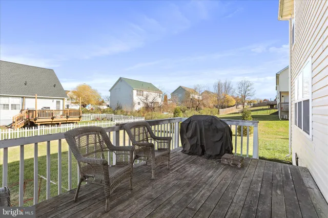 a view of a chairs on the roof deck