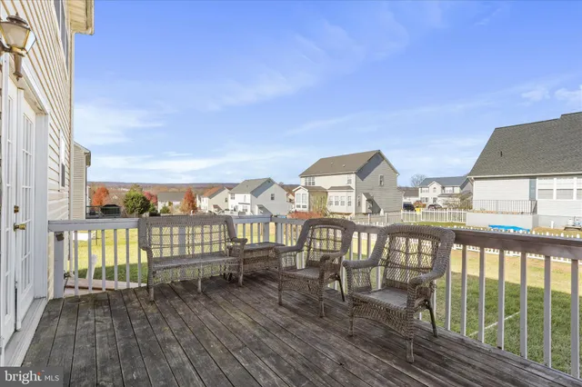 a view of a houses from a balcony