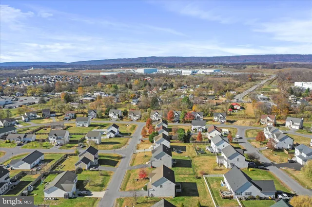 an aerial view of residential building with parking space