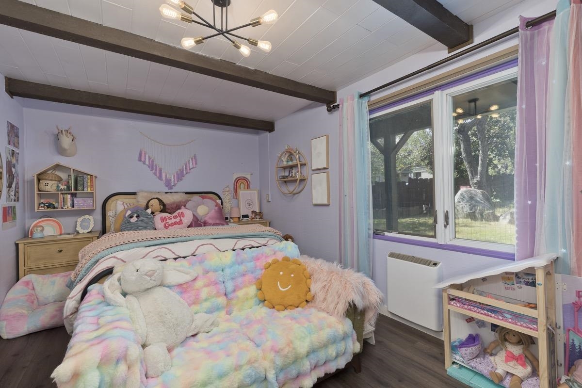 3251 Chateau Road, Unit 12 Mammoth Lakes, CA 93546 - Photo 11 of 50 a bedroom with a bed a dresser next to a window