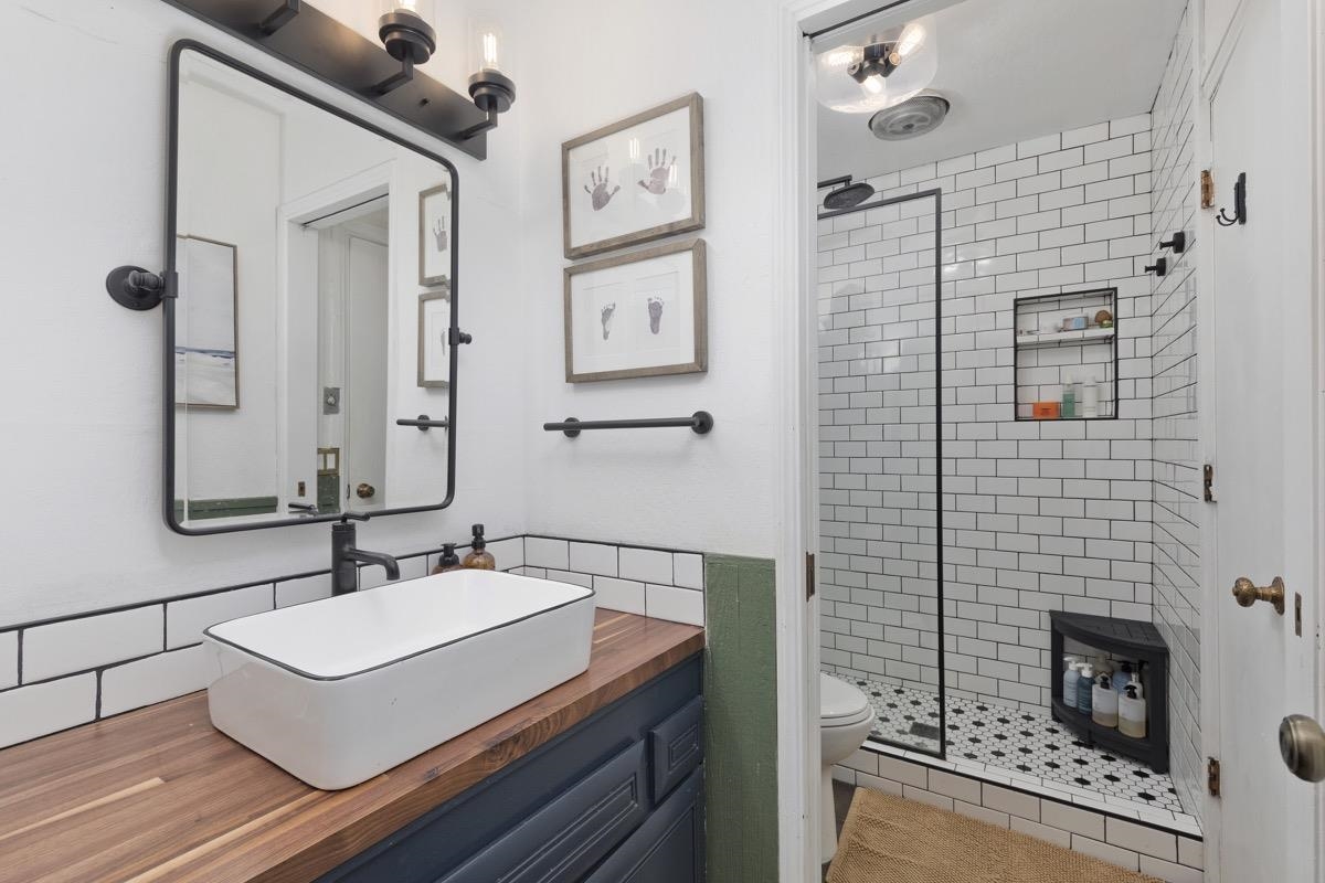 3251 Chateau Road, Unit 12 Mammoth Lakes, CA 93546 - Photo 13 of 50 a bathroom with a sink a mirror and a shower