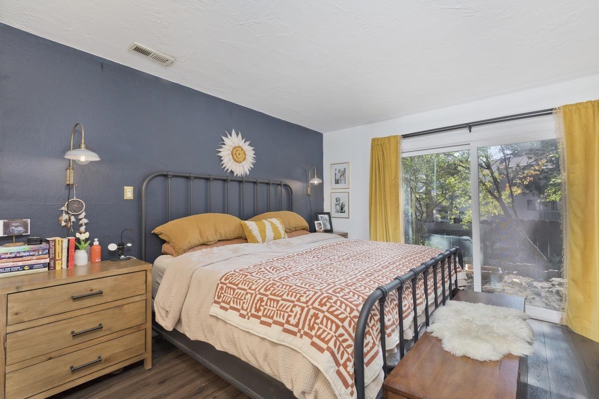 3251 Chateau Road, Unit 12 Mammoth Lakes, CA 93546 - Photo 15 of 50 a bedroom with a bed and a window