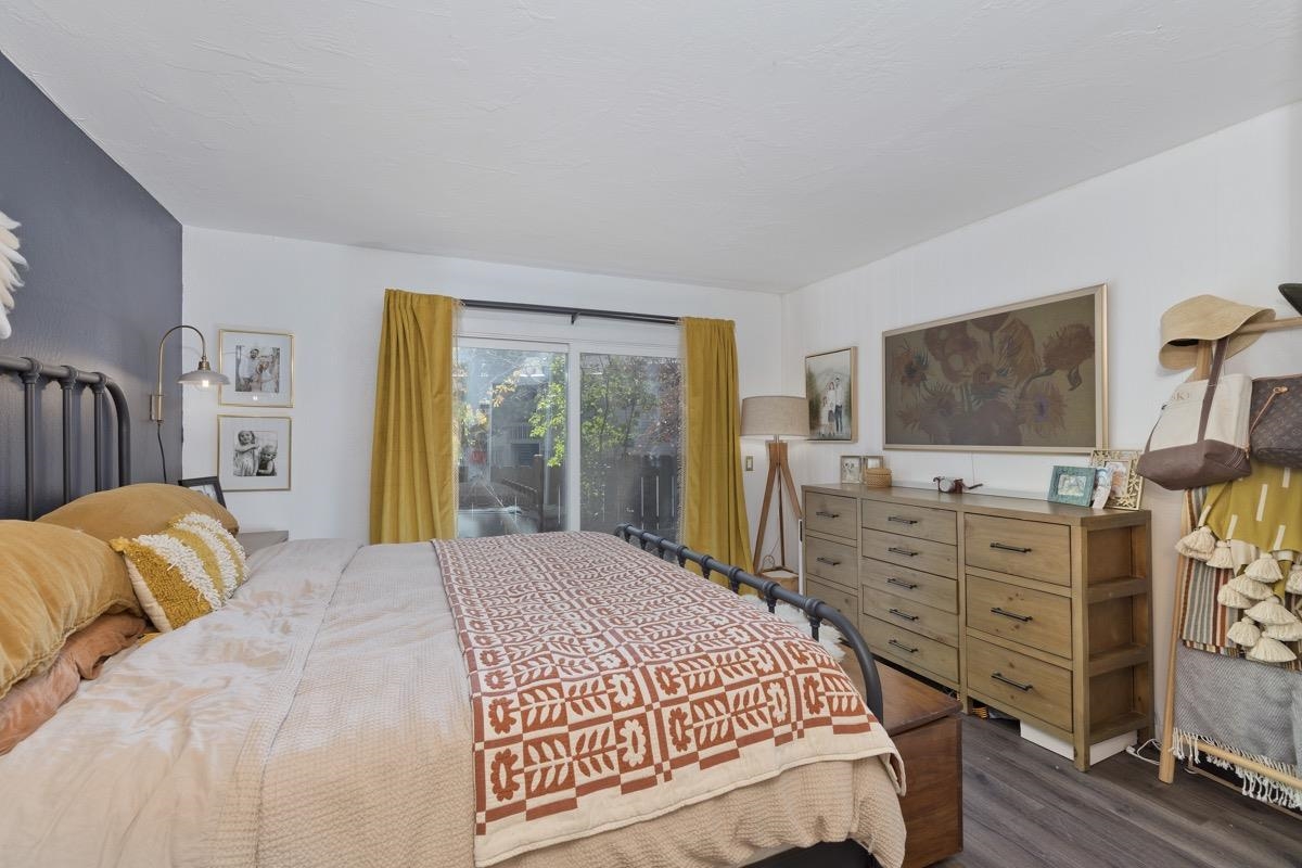 3251 Chateau Road, Unit 12 Mammoth Lakes, CA 93546 - Photo 16 of 50 a bedroom with a bed and a flat screen tv