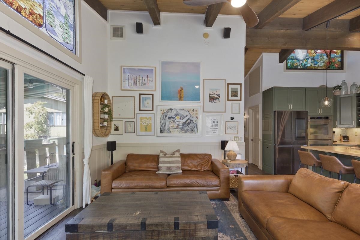 3251 Chateau Road, Unit 12 Mammoth Lakes, CA 93546 - Photo 29 of 50 a living room with furniture and a flat screen tv