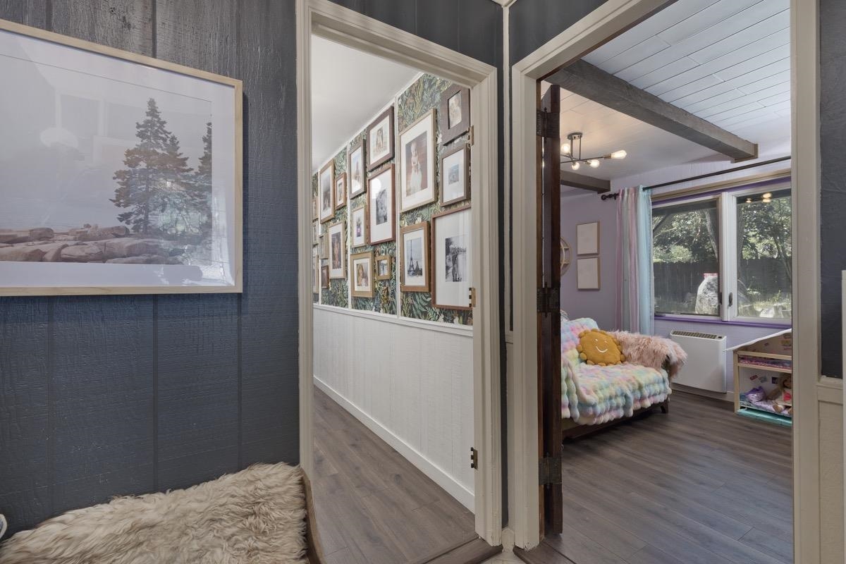 3251 Chateau Road, Unit 12 Mammoth Lakes, CA 93546 - Photo 30 of 50 a bedroom with furniture and large window