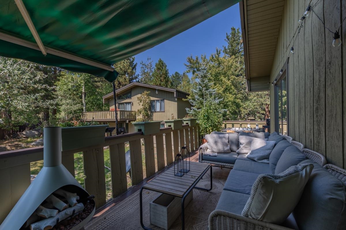 3251 Chateau Road, Unit 12 Mammoth Lakes, CA 93546 - Photo 32 of 50 a view of a balcony with furniture