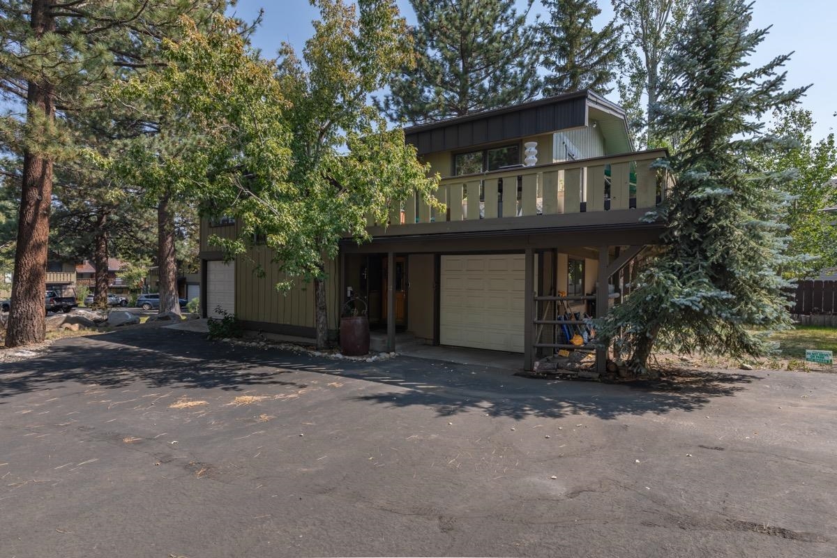 3251 Chateau Road, Unit 12 Mammoth Lakes, CA 93546 - Photo 39 of 50 a view of a house with a yard and tree