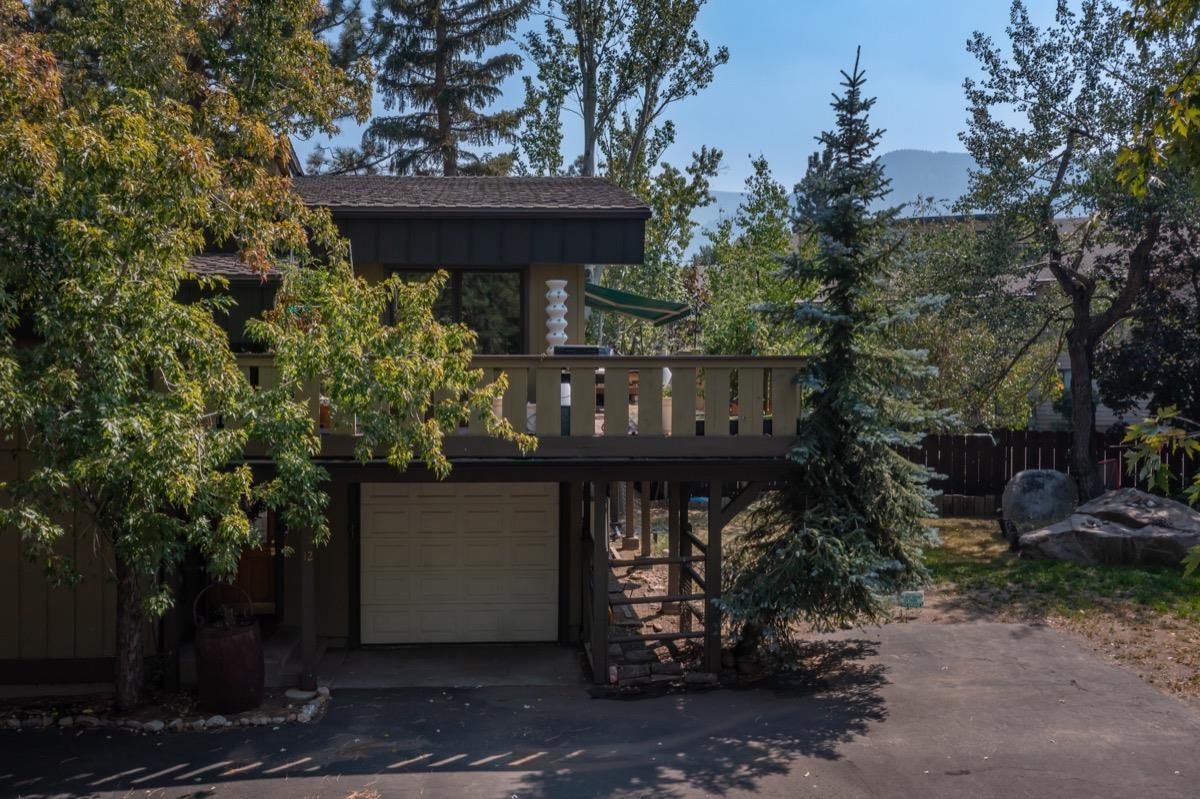 3251 Chateau Road, Unit 12 Mammoth Lakes, CA 93546 - Photo 41 of 50 a front view of a house with garden