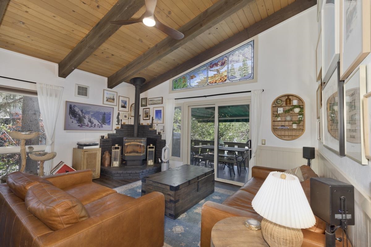 3251 Chateau Road, Unit 12 Mammoth Lakes, CA 93546 - Photo 5 of 50 a living room with furniture a table and a large window