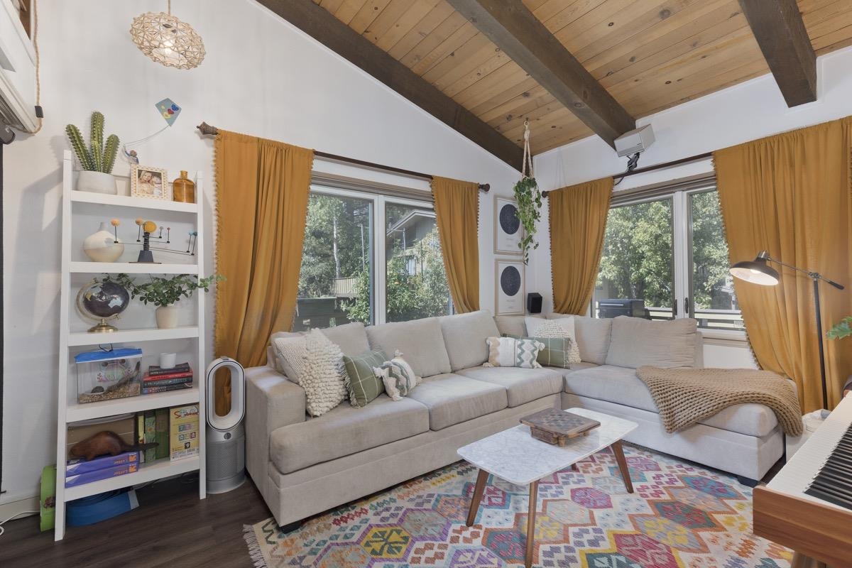 3251 Chateau Road, Unit 12 Mammoth Lakes, CA 93546 - Photo 6 of 50 a living room with furniture and a large window