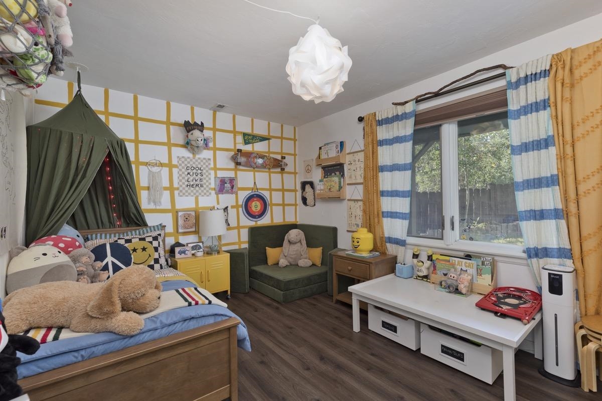 3251 Chateau Road, Unit 12 Mammoth Lakes, CA 93546 - Photo 9 of 50 a living room with furniture and a flat screen tv