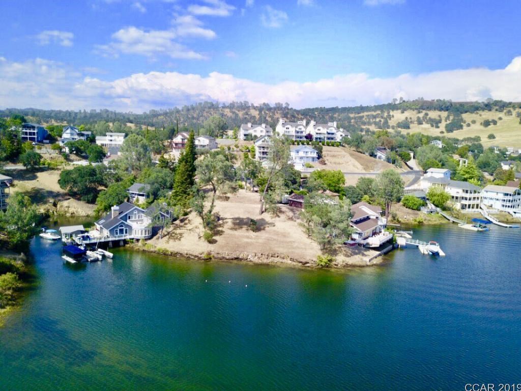 324 Sunrise Road Copperopolis, CA 95228 - Photo 1 of 1 a view of a lake with a city