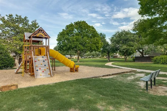 a park view with a slide