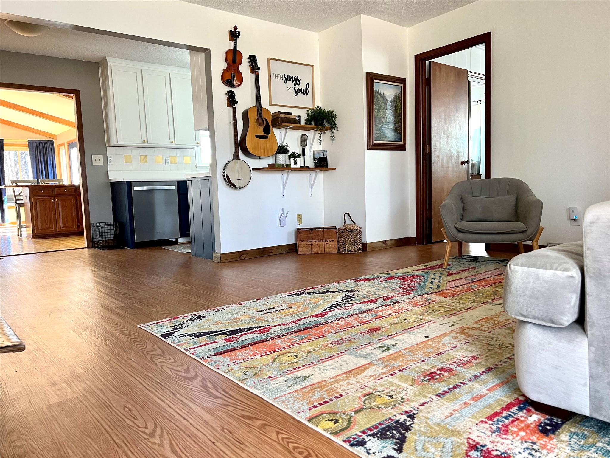 3430 Rimer Road Concord, NC 28025 - Photo 4 of 32 a living room with furniture and a wooden floor