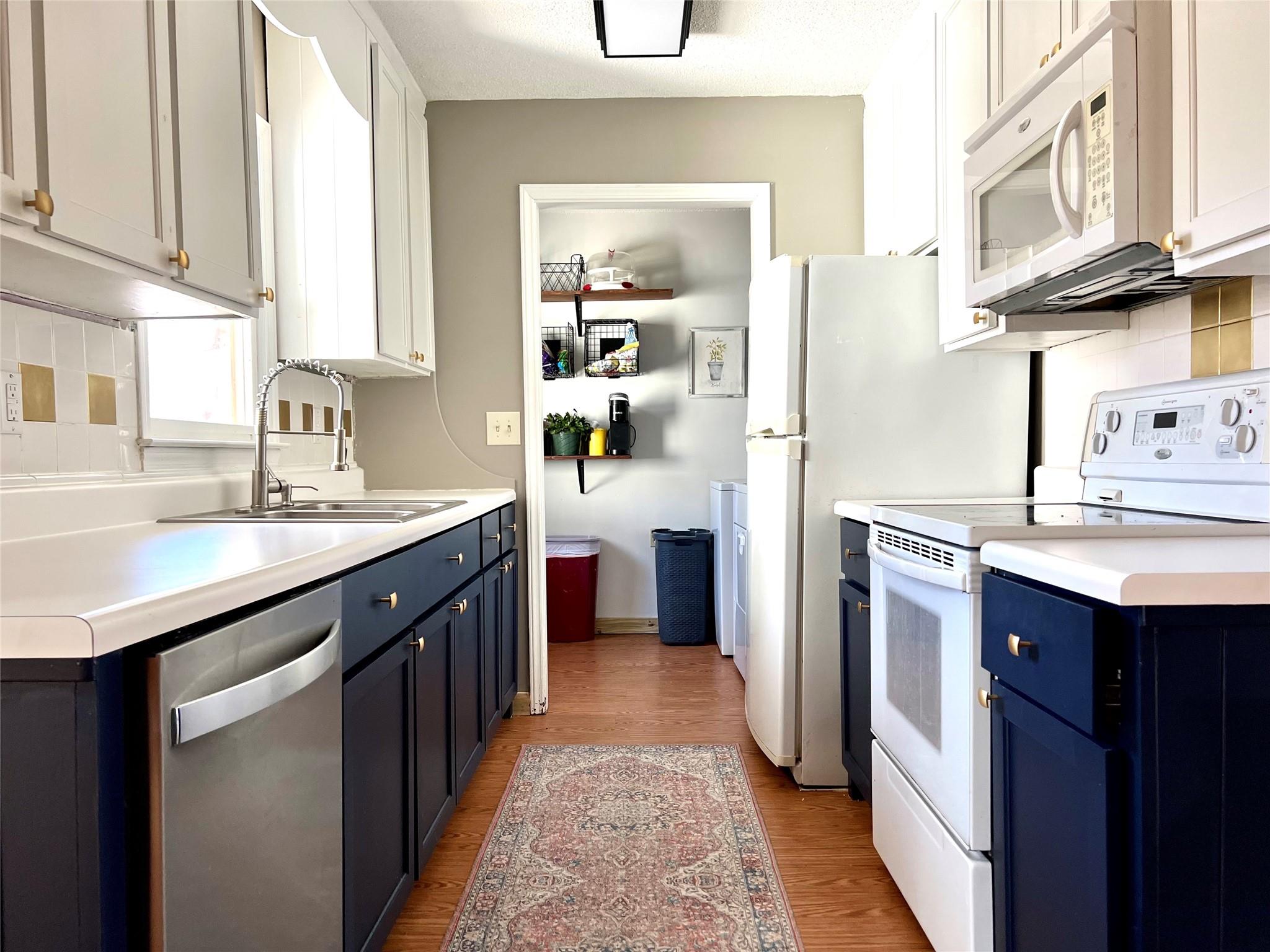 3430 Rimer Road Concord, NC 28025 - Photo 6 of 32 a kitchen with stainless steel appliances granite countertop a refrigerator and a sink