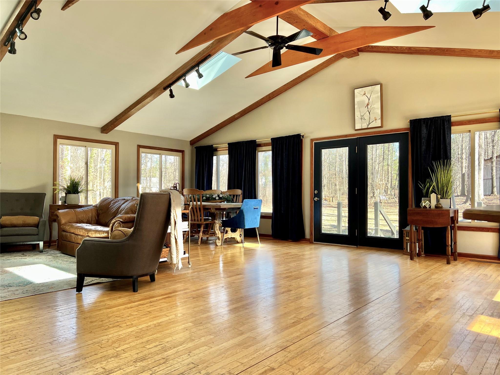 3430 Rimer Road Concord, NC 28025 - Photo 8 of 32 a living room with furniture and a wooden floor