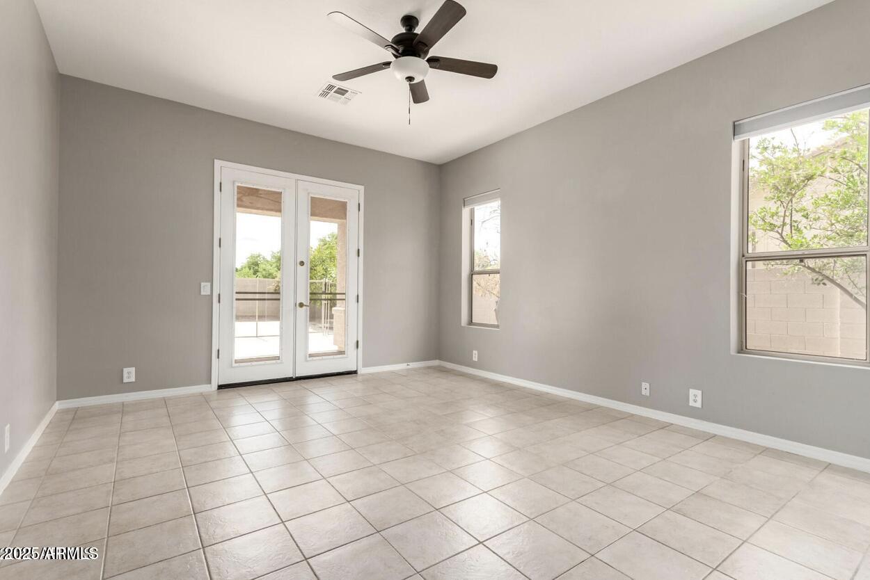 1515 North Los Alamos Circle Mesa, AZ 85213 - Photo 14 of 39 a view of an empty room with a window