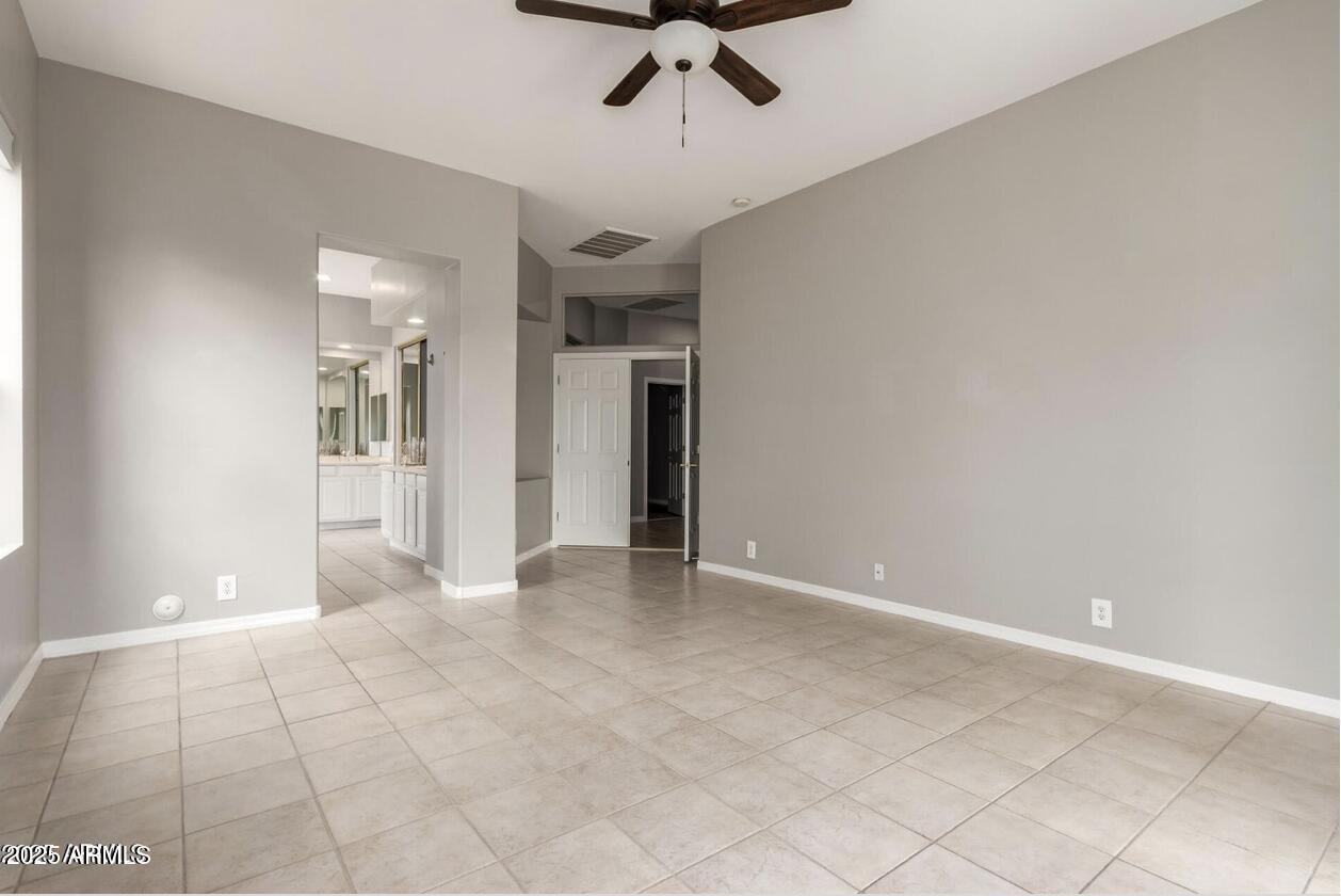 1515 North Los Alamos Circle Mesa, AZ 85213 - Photo 15 of 39 a view of a livingroom with a staircase