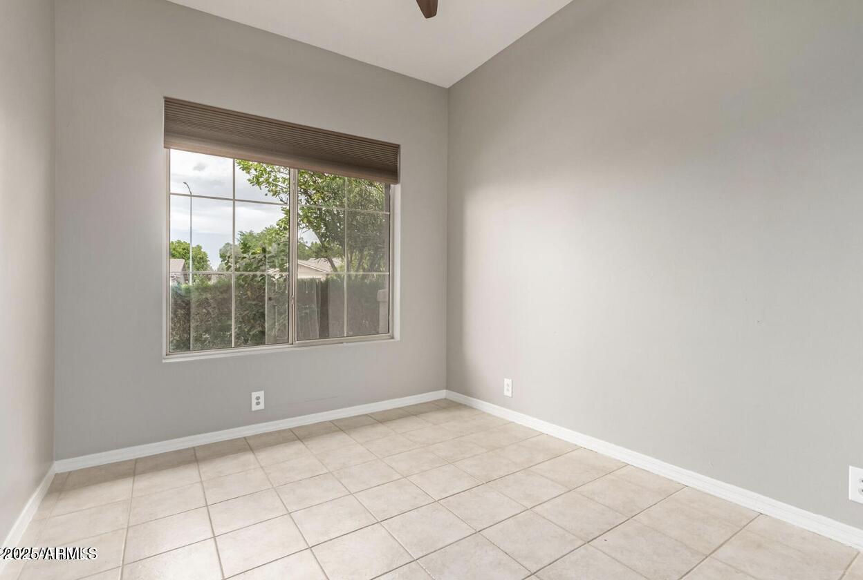 1515 North Los Alamos Circle Mesa, AZ 85213 - Photo 20 of 39 a view of an empty room with a window