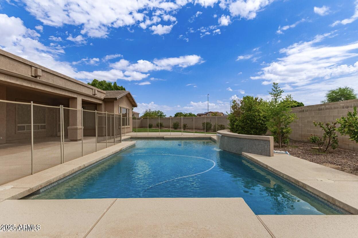 1515 North Los Alamos Circle Mesa, AZ 85213 - Photo 8 of 39 a view of swimming pool with seating space