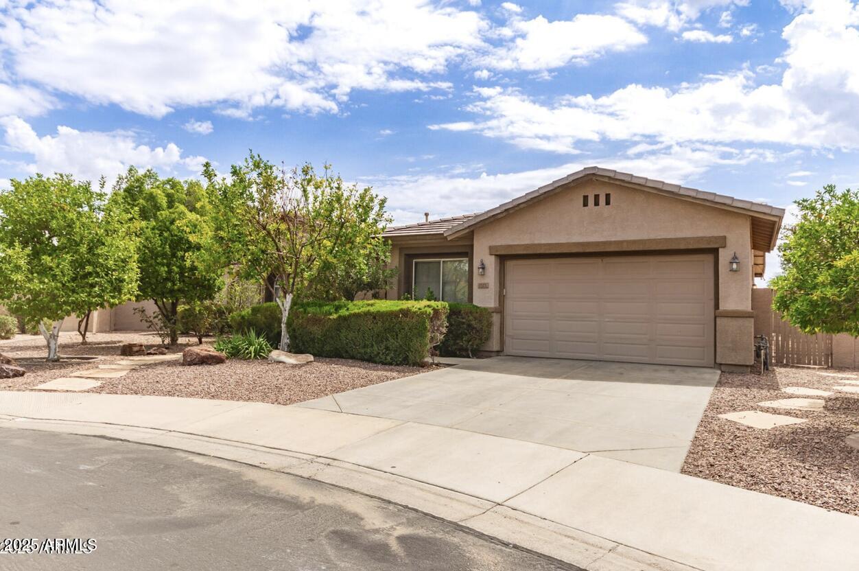 1515 North Los Alamos Circle Mesa, AZ 85213 - Photo 10 of 39 front view of a house with a pathway