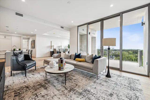 a kitchen with granite countertop cabinets a sink and appliances