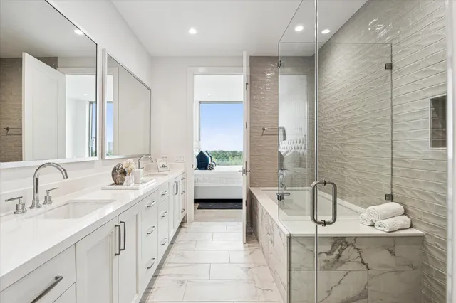 a living room with lots of furniture and a large window