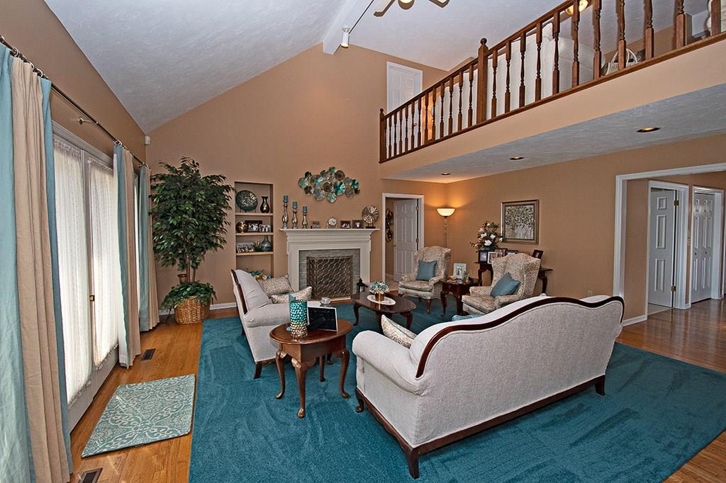 118 Oak Ridge Drive Butler, PA 16002 - Photo 11 of 25 Living room with vaulted ceiling