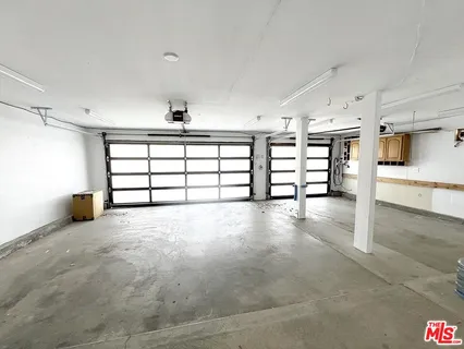 a view of a kitchen with a sink and a stove