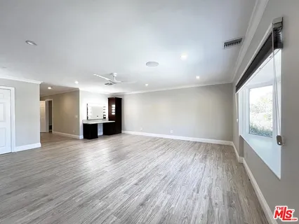 a bathroom with a shower and a toilet