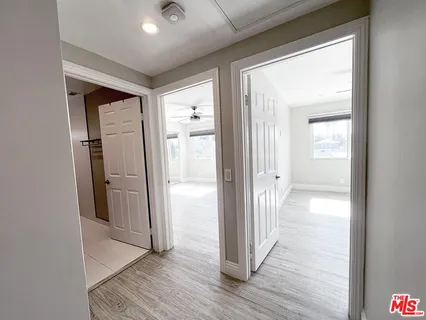 a view of a house with a yard and a garden