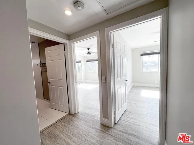 a view of a house with a yard and a garden