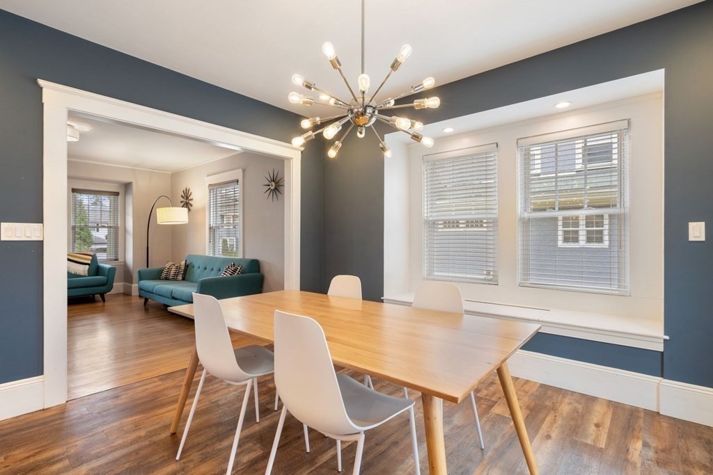 38 Jackson Road Medford, MA 02155 - Photo 13 of 42 a view of a dining room with furniture and wooden floor