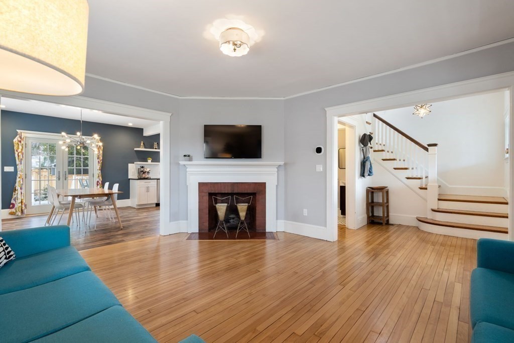 38 Jackson Road Medford, MA 02155 - Photo 15 of 42 a living room with furniture and a fireplace