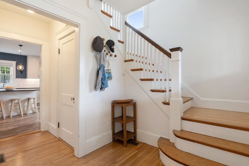 38 Jackson Road Medford, MA 02155 - Photo 19 of 42 a view of entryway and hall with wooden floor