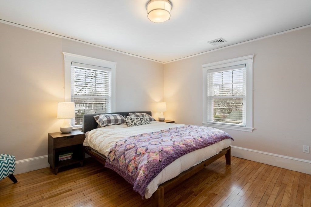 38 Jackson Road Medford, MA 02155 - Photo 20 of 42 a bedroom with a bed and a window