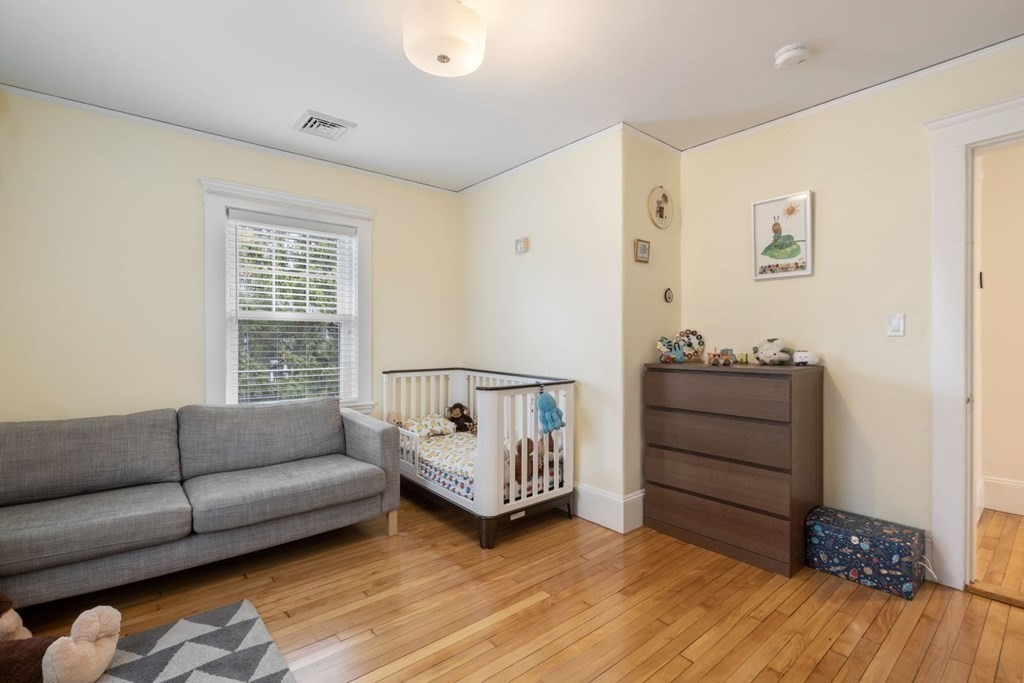 38 Jackson Road Medford, MA 02155 - Photo 27 of 42 a living room with furniture and a window