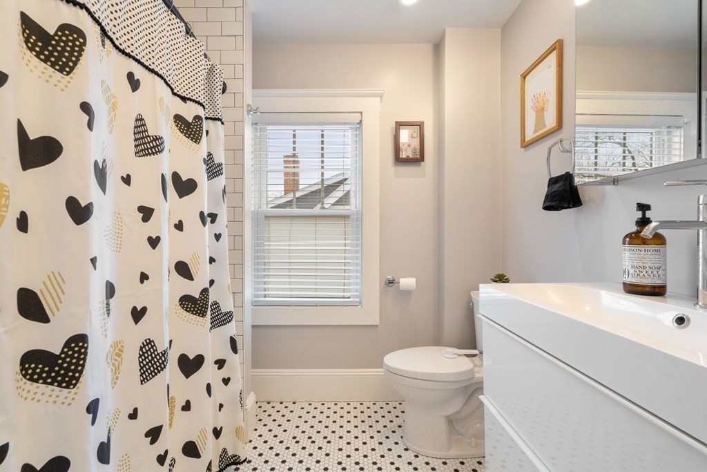 38 Jackson Road Medford, MA 02155 - Photo 31 of 42 a bathroom with a sink toilet and shower