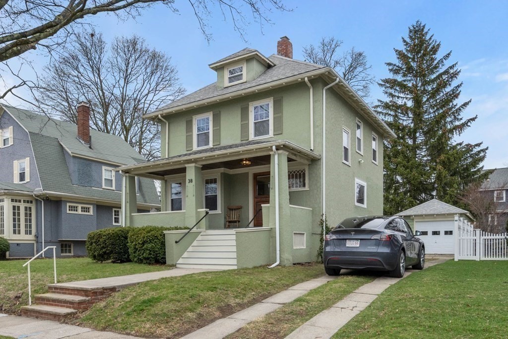 38 Jackson Road Medford, MA 02155 - Photo 33 of 42 a front view of a house with a yard